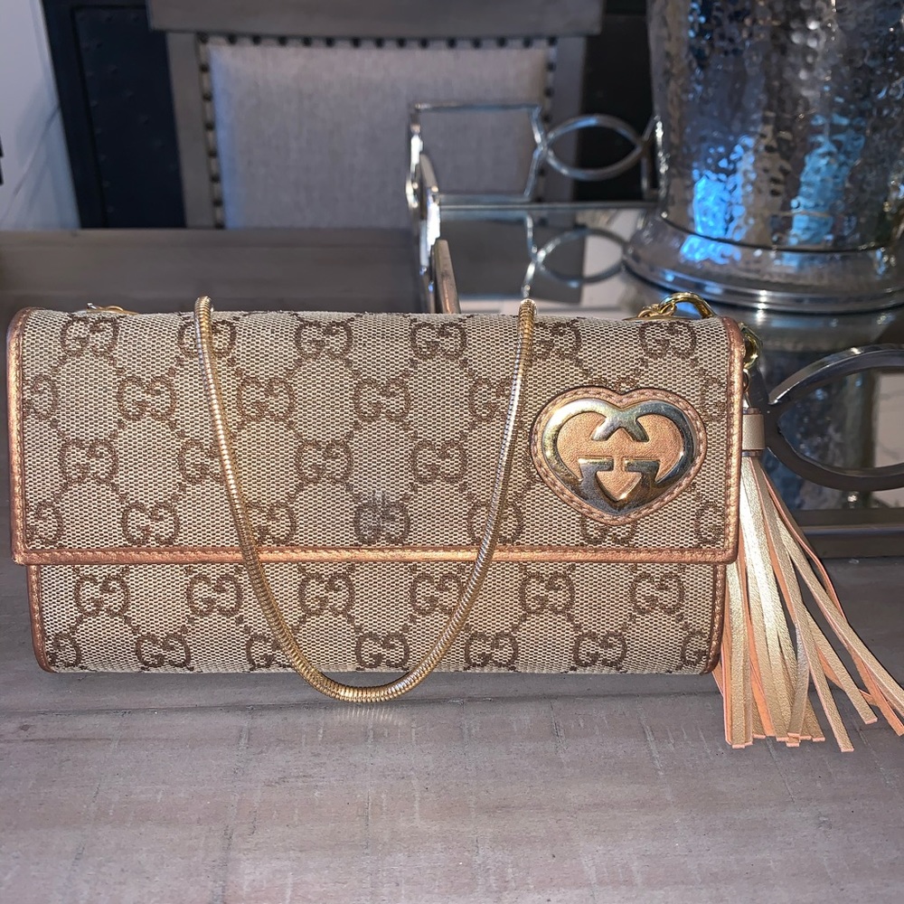 Gucci bronze trim monogram crossbody wallet w/ cer